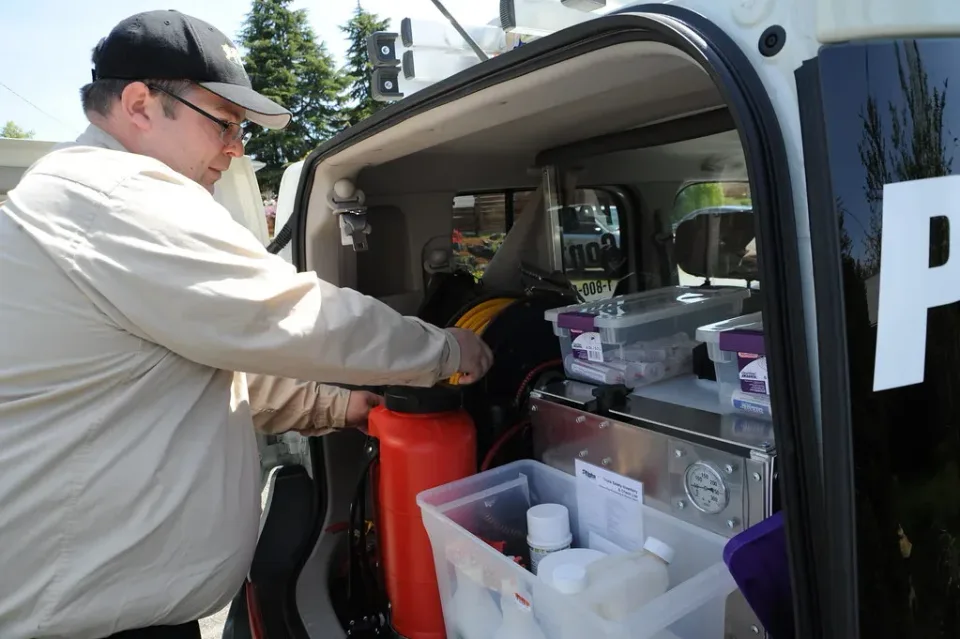 Pest Control Technician — Service Vehicle Interior Pest Control Technician — Service Vehicle Interior — Pest Control Technician, Service Vehicle, Pressure Sprayer, Pest Contro…